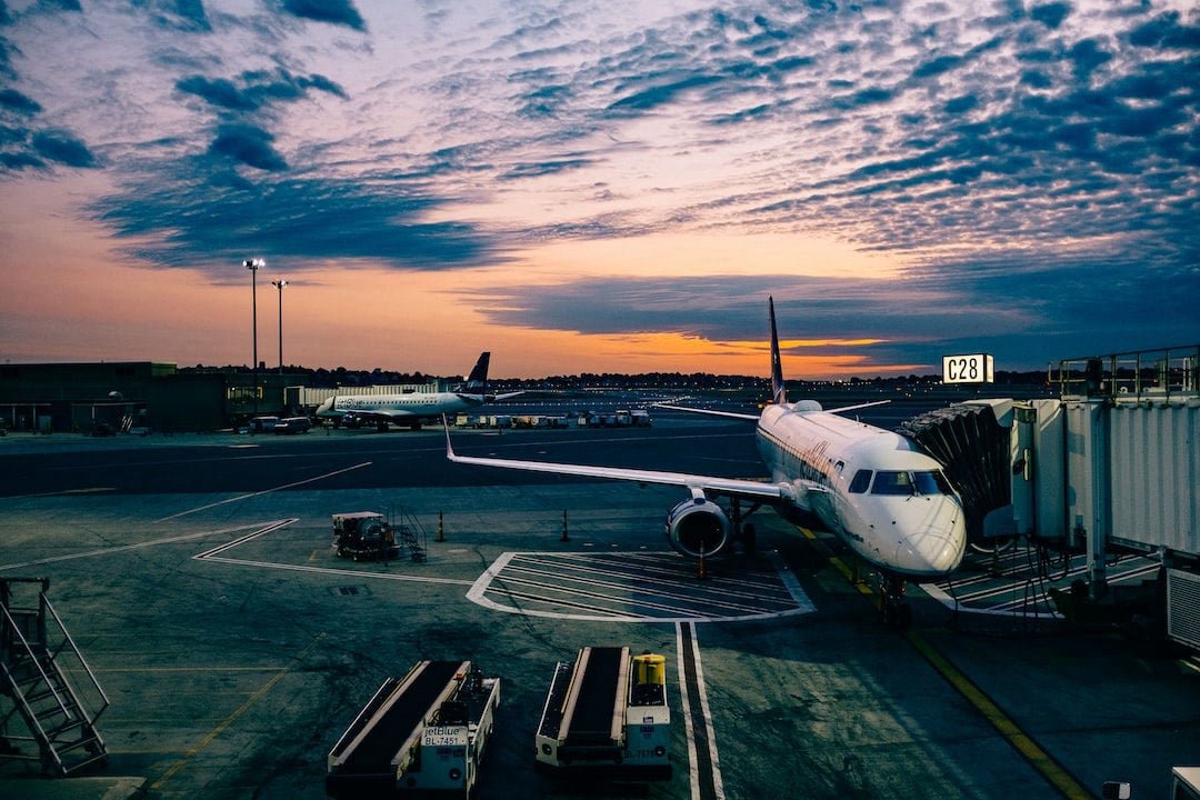 Traveler checking flight deals